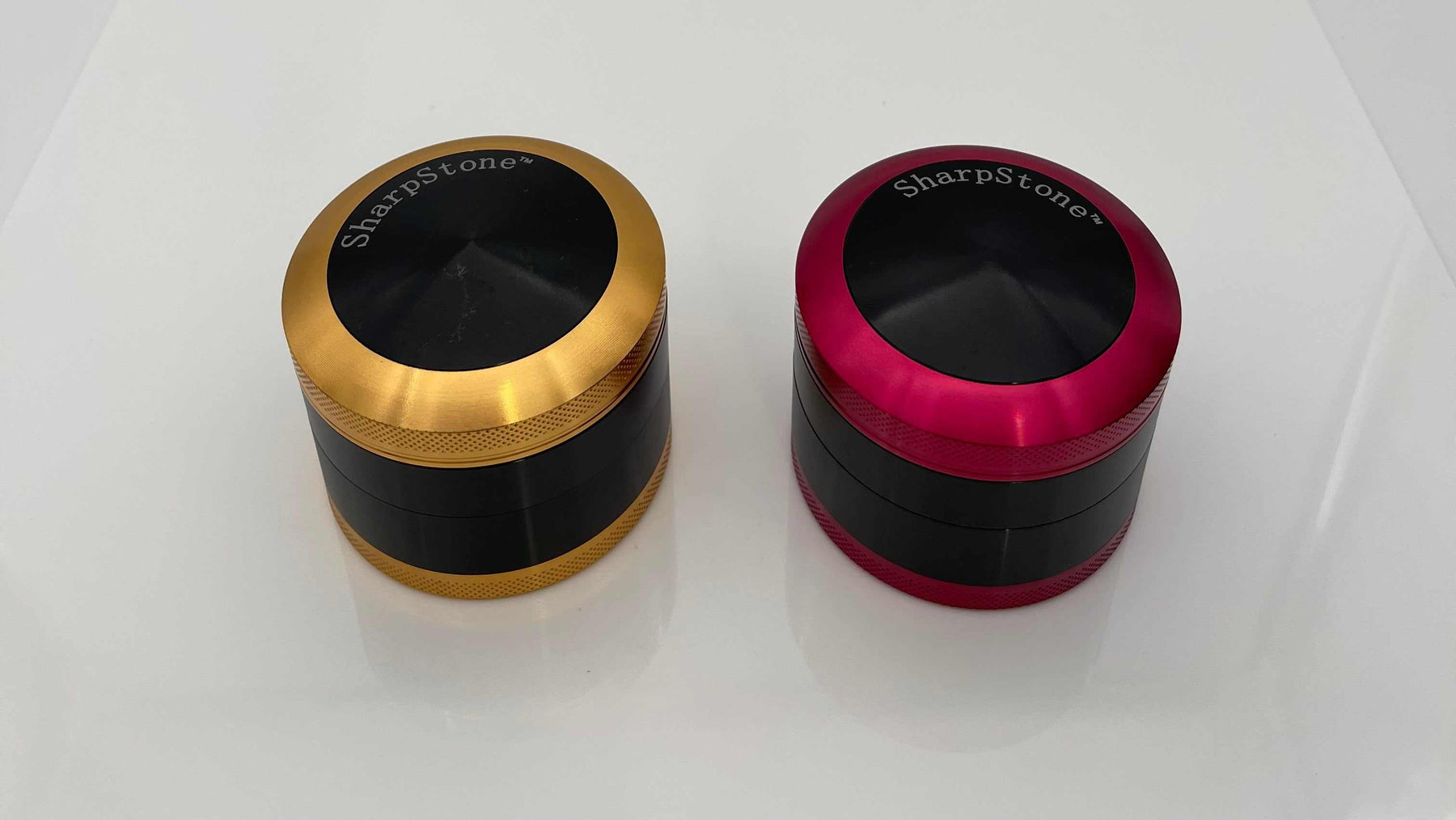 SHARPSTONE® Hard Top 4 Piece Grinder - 2.5" in gold and red, aircraft grade aluminum, smooth finish.