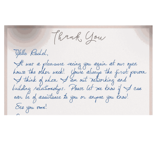Handwritten thank you note with personalized message in blue ink on white paper