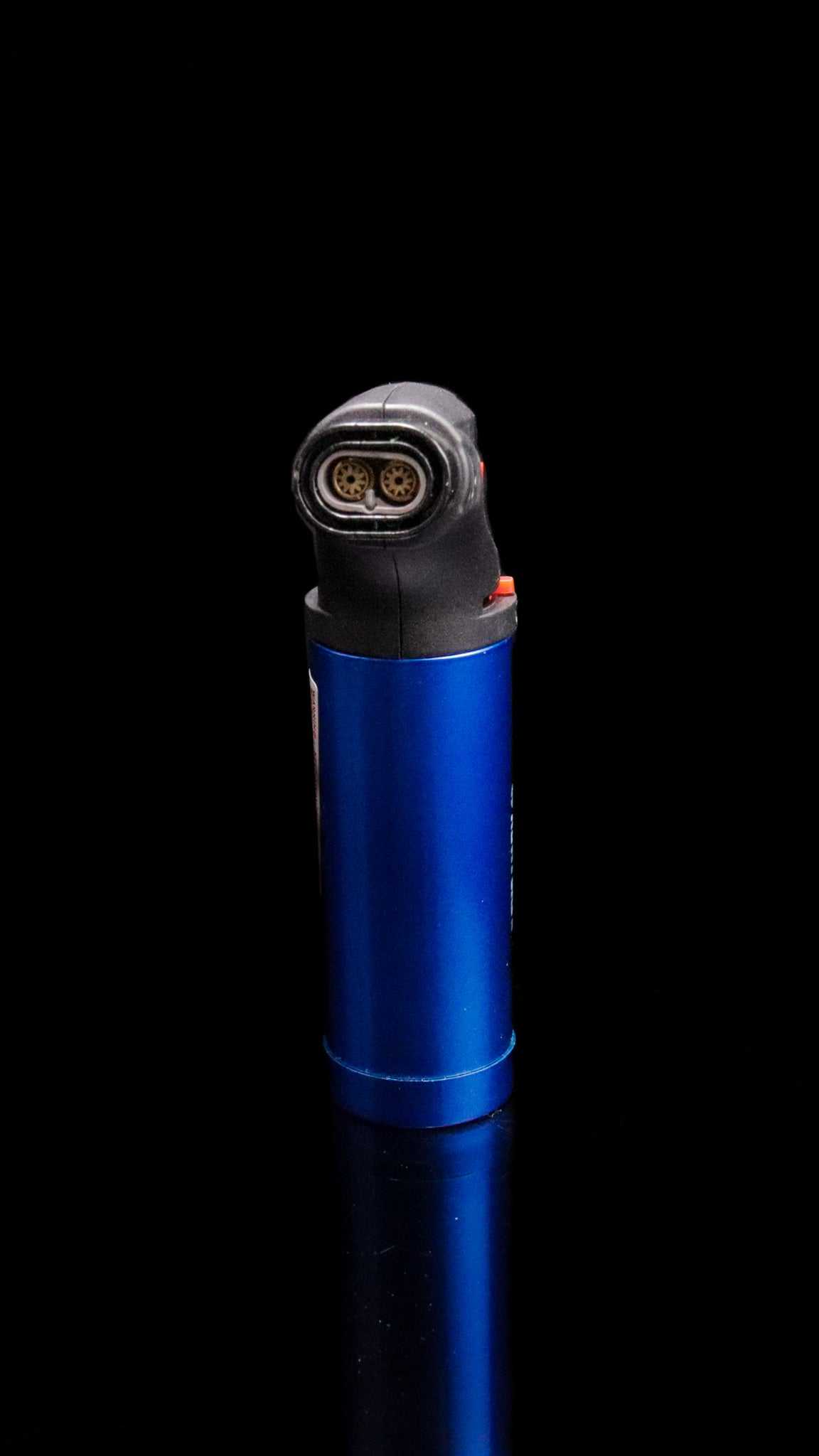 Blue Newport Zero Micro Torch with auto ignition and safety lock against black background