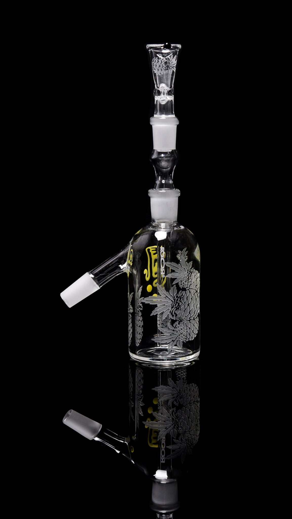 ROOR® Custom Pineapple Express ash-catcher with sandblasted glass body and 14.5mm joint on black background