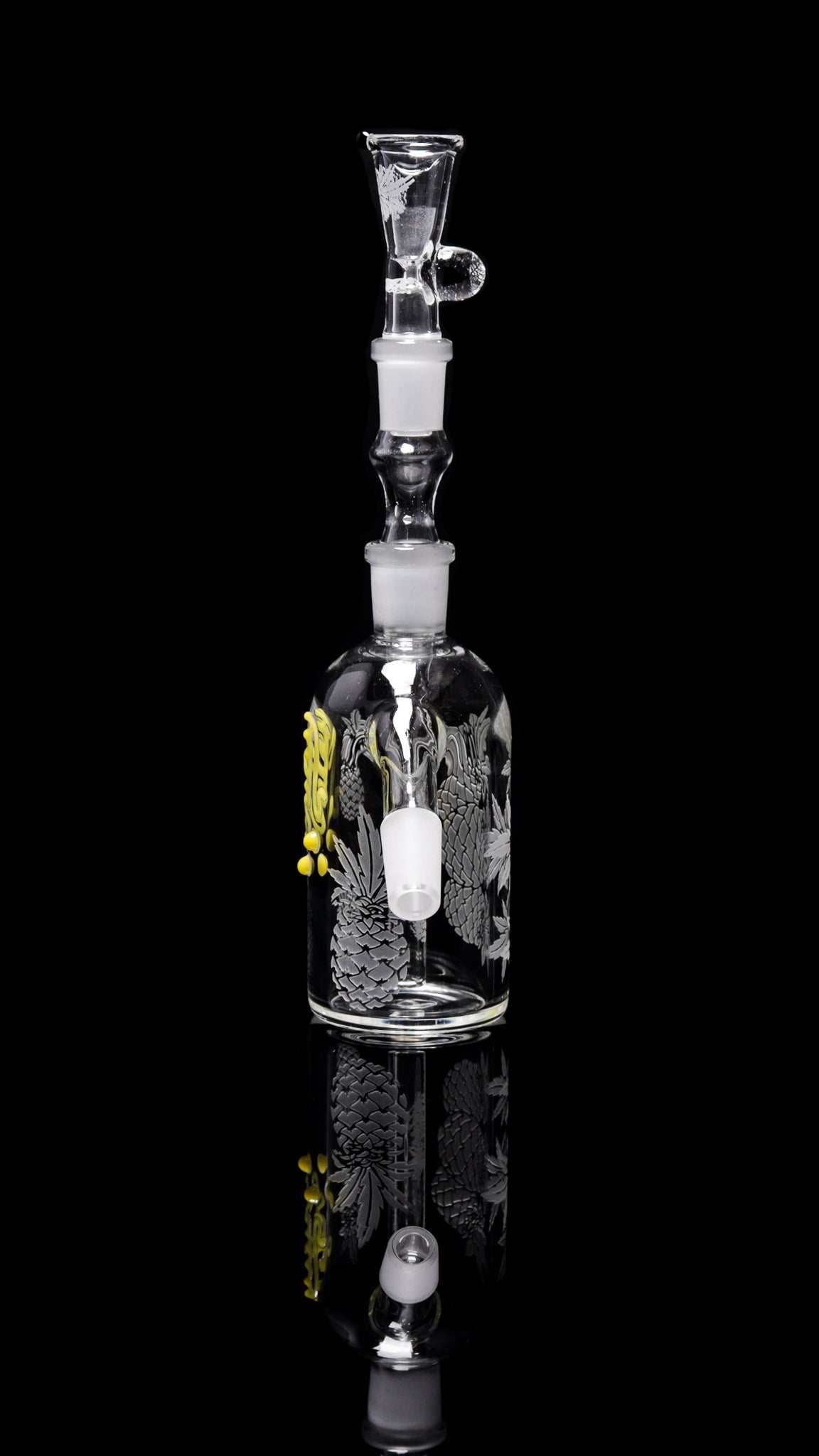 ROOR® Custom Pineapple Express ash catcher with sandblasted glass body and 14.5mm joint on black background