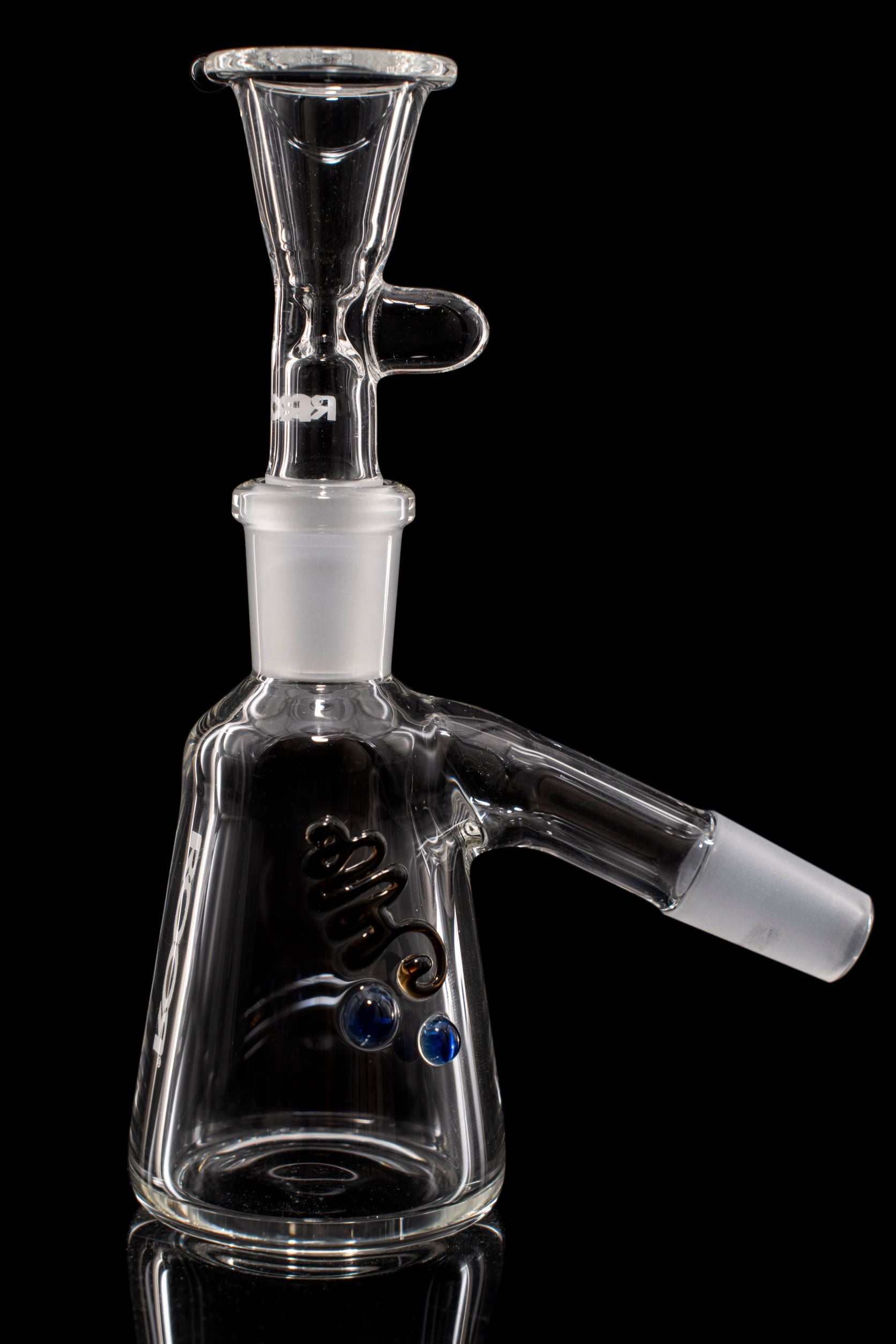 Clear ROOR® Debris Catcher glass accessory with angled arm and white decal logo