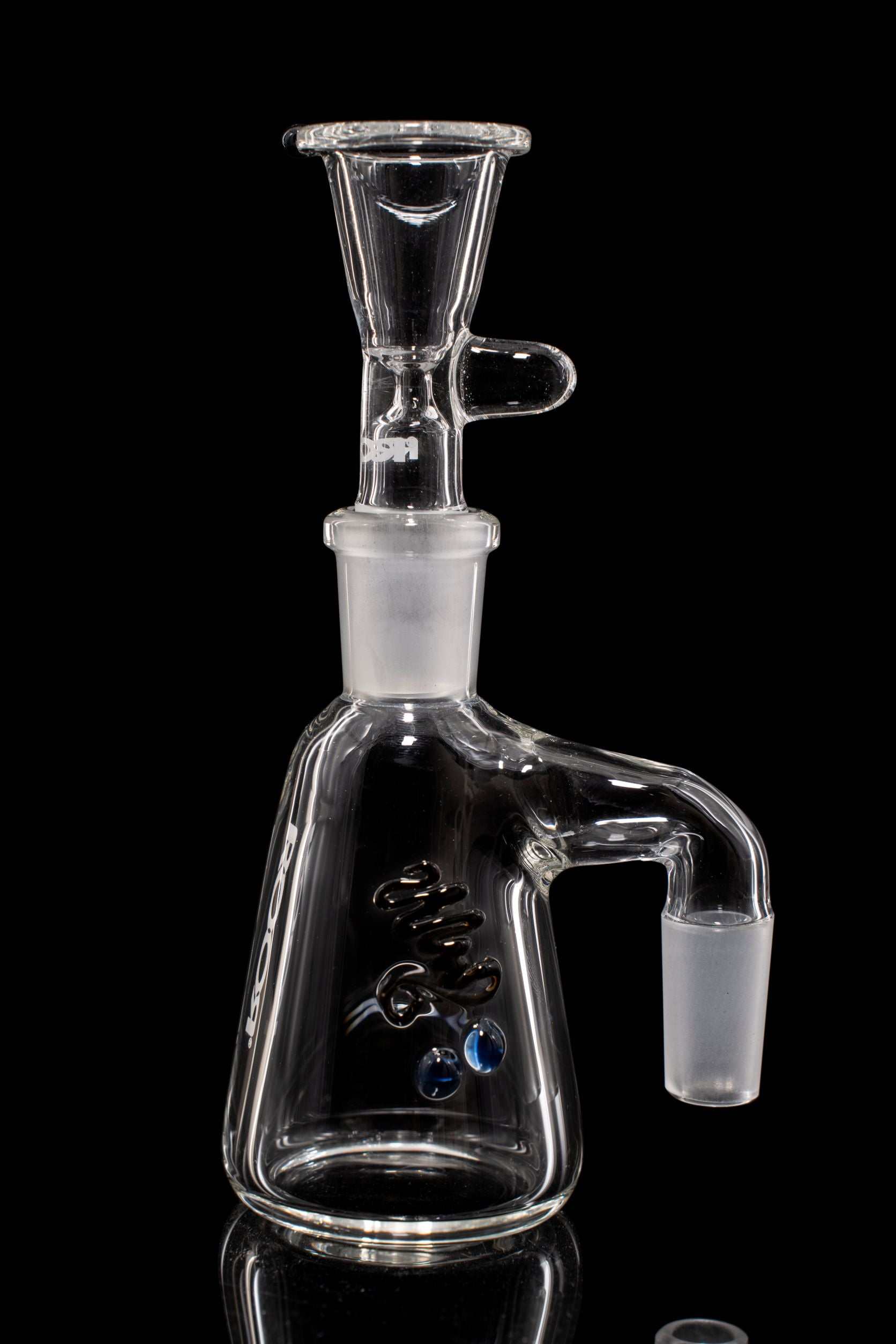 Clear ROOR® Debris Catcher glass piece with angled arm and white decal on black background