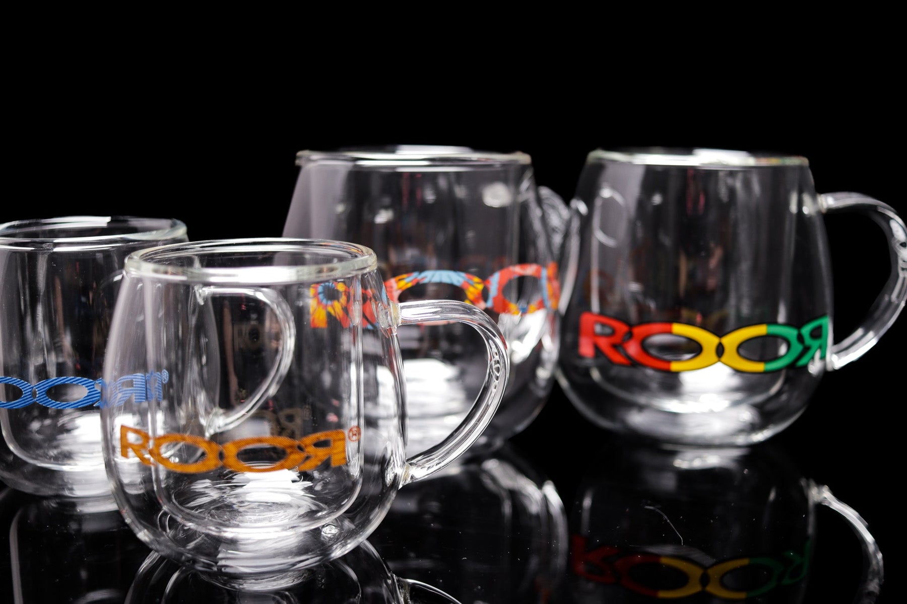 ROOR® Glass Mugs Double Layer with colorful decals, showcasing sleek design and double-walled insulation.