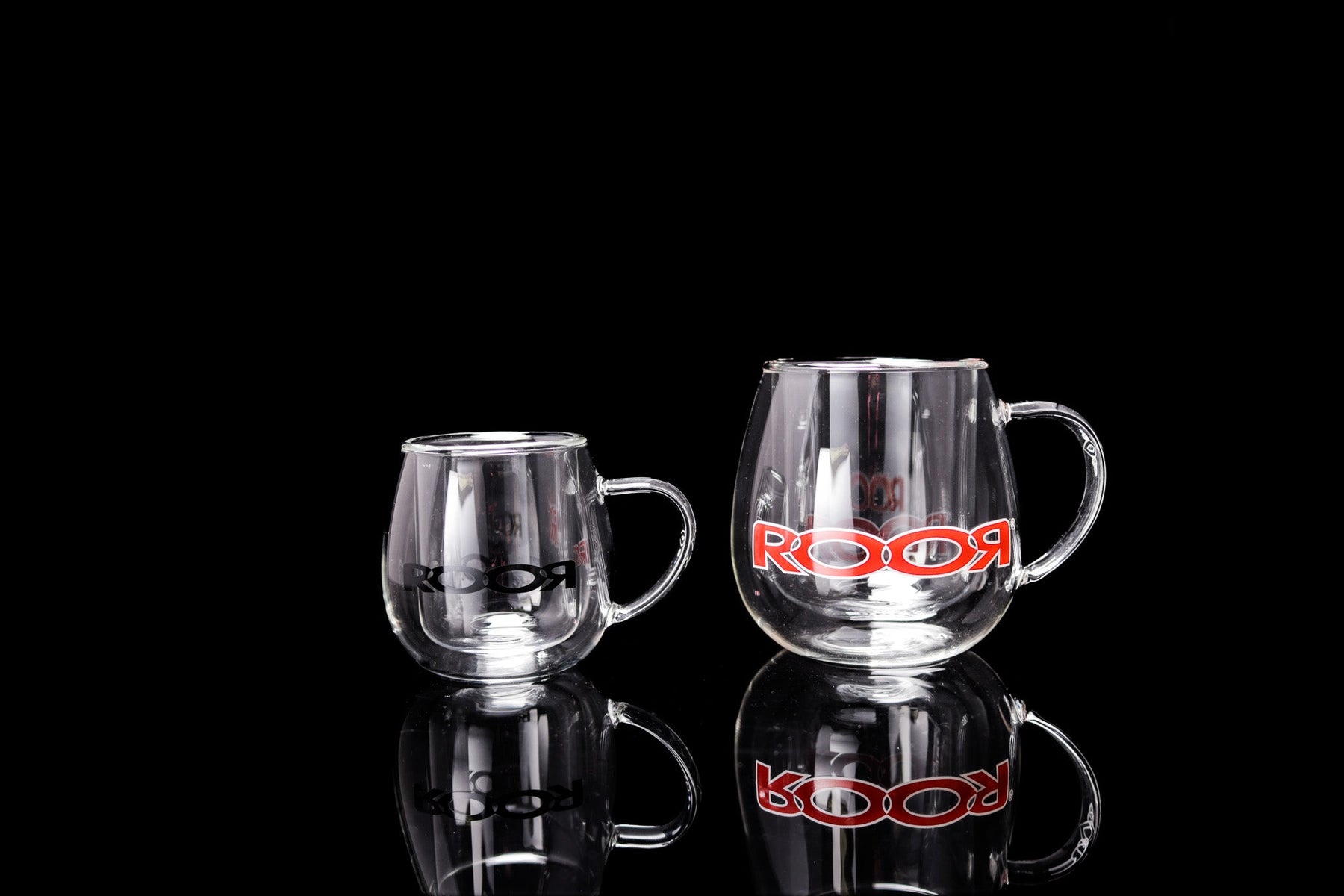 ROOR® Glass Mugs Double Layer with logo, double-walled design, reflecting sleek style.
