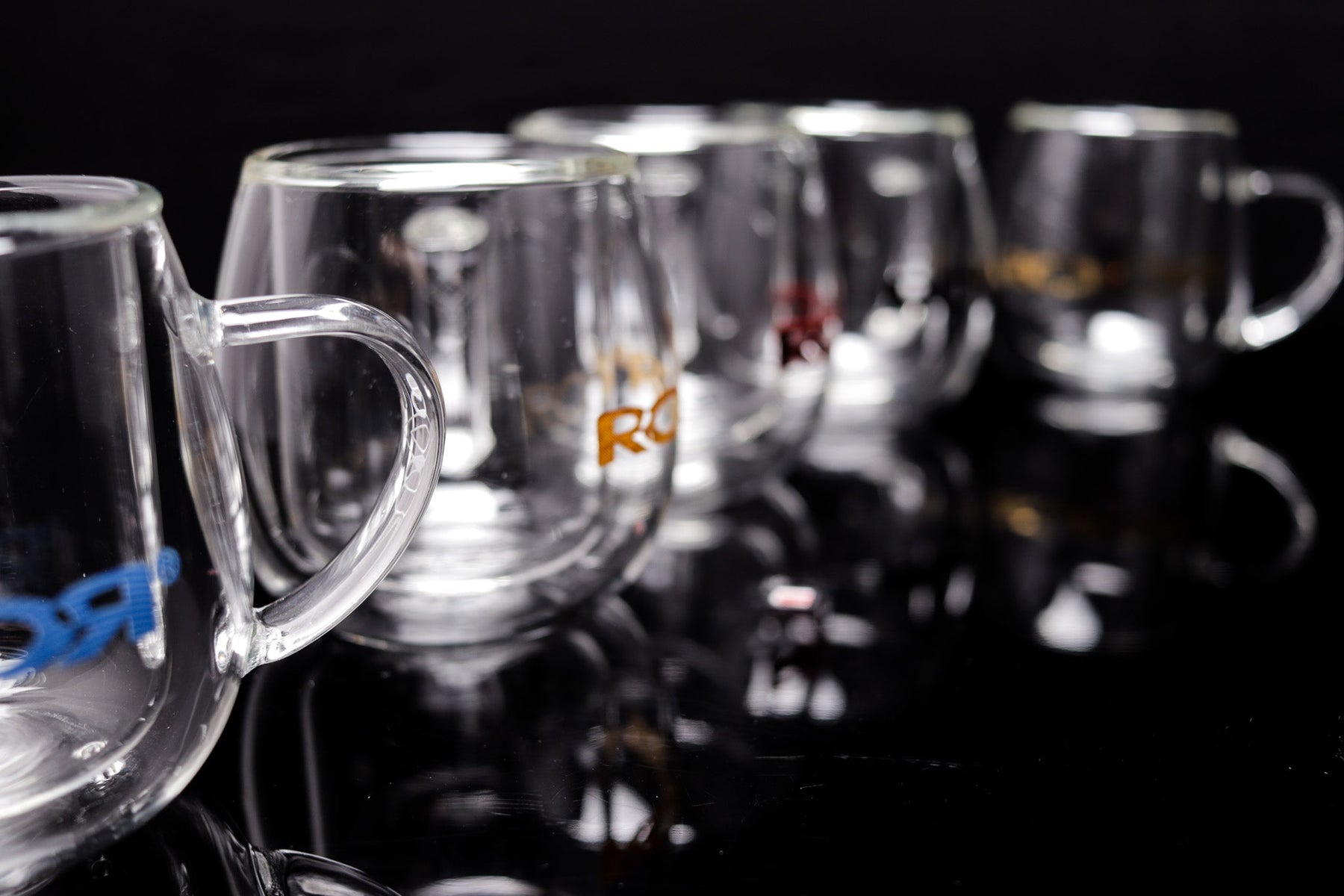 ROOR® Glass Mugs Double Layer displayed on black surface with visible logos.